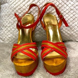 Coral and yellow platform heels!!! Perfect addition to any look.